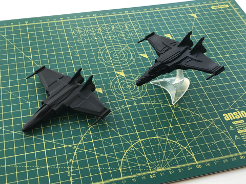 3d printed spaceships on a craft mat